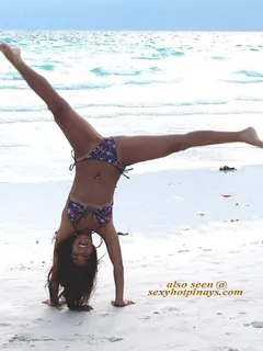 aubrey miles does a very hot cartwheel.