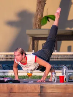 dua lipa braless boobs showing off her tits pokies in a white top seen doing yoga and looking sexy by paparazzi.