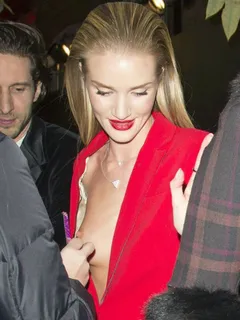 rosie huntington-whiteley nip slip and sideboob at  british fashion awards in london