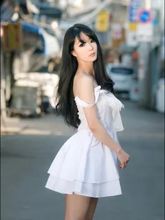 im soo yeon in a lovely white dress and cream high heels