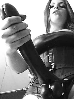 mistress prepares her huge strapon