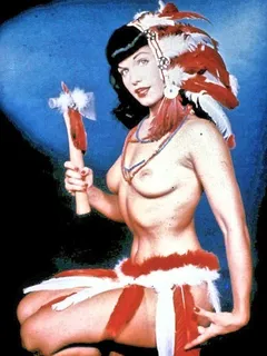 betty page revels in her beautiful world of depraved fun