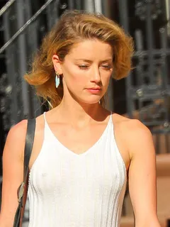 amber heard braless in see through white dress