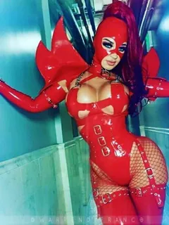 bimbo in a stunning red latex outfit (@ice_queen_co)