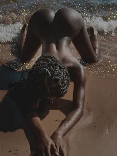 dark skinned beauty at the beach