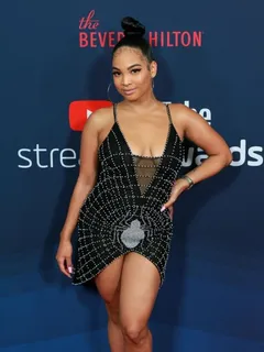 aliya janell braless boobs showing nice cleavage in a sexy little low cut dress at the streamy awards.