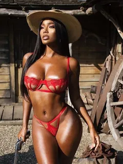 monifa jansen dressed as a sexy gunslinger