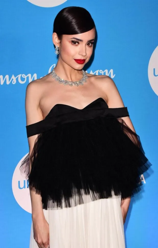 sofia carson gorgeous in a sexy dress photographed by paparazzi as she arrived to the unicef snowflake ball.