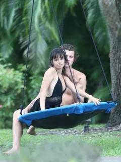 shawn mendes and camila cabello still quarantining together with camila looking sexy on a swing seen by paparazzi in florida.