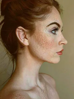 skinny redhead with freckles in profile