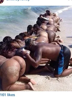 sexy black asses bent over on the beach