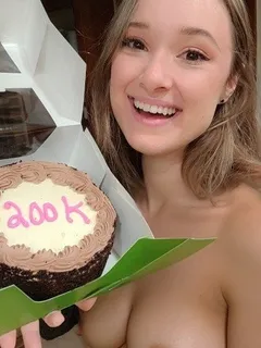 amy kay asmr celebrates a youtube subscription milestone with cake and nudity