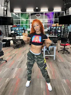 jakara jackson in a crop top and camo pants