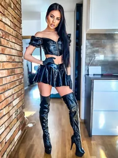 dominatrix evil_woman in a latex bdsm outfit