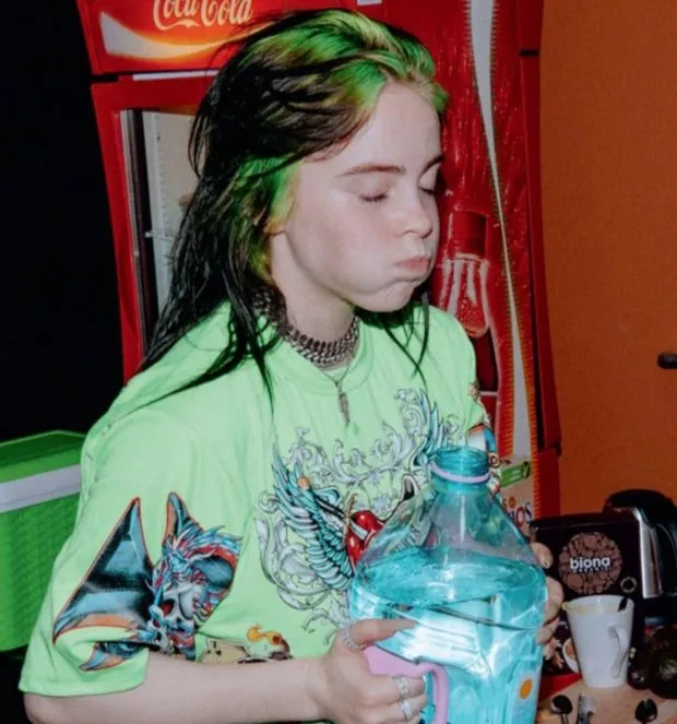 billie e ilish photo book billie drinking water
