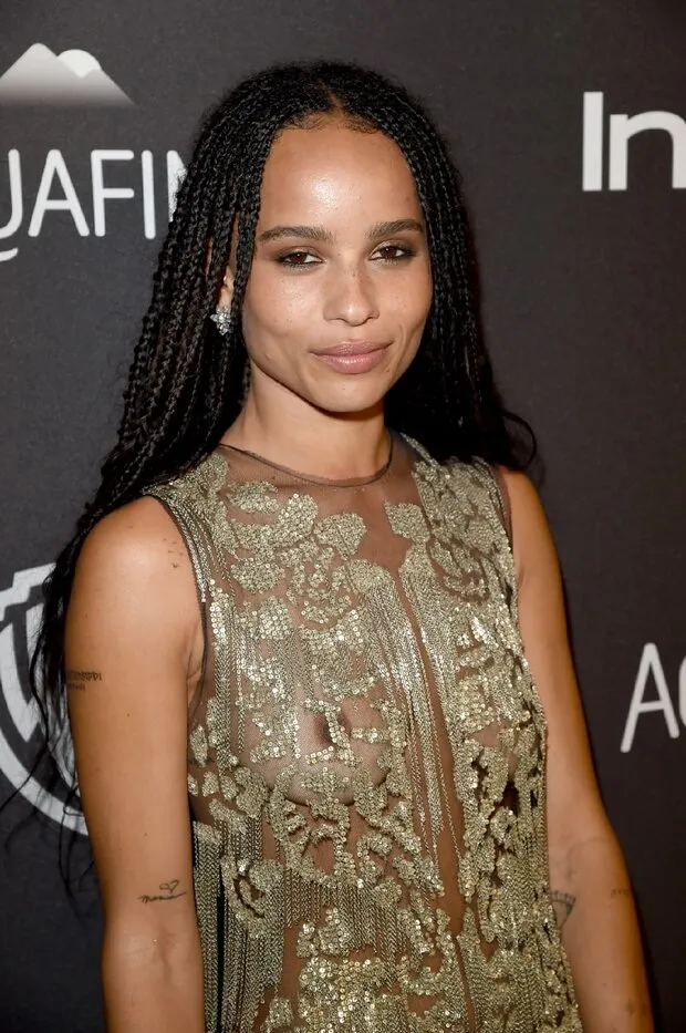 zoe kravitz in see through top showing nipples at golden globes awards post party.