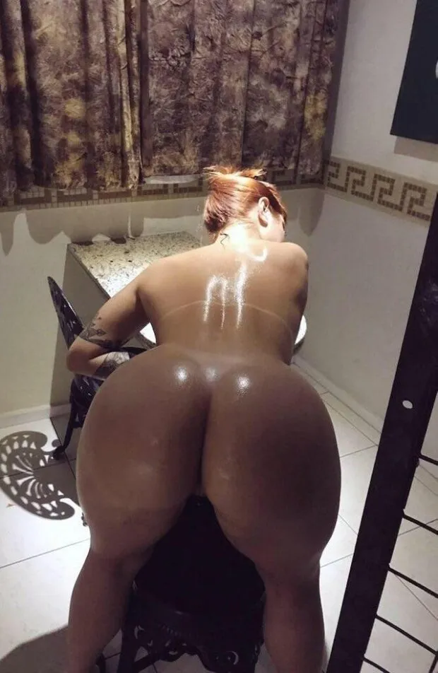 oiled up bent over