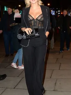 ashley james boobs in a see through black lingerie top showing off her tits seen by paparazzi in london.