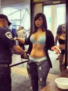 hottie getting strip searched at the airport.