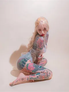 pouty tattooed cute blonde.