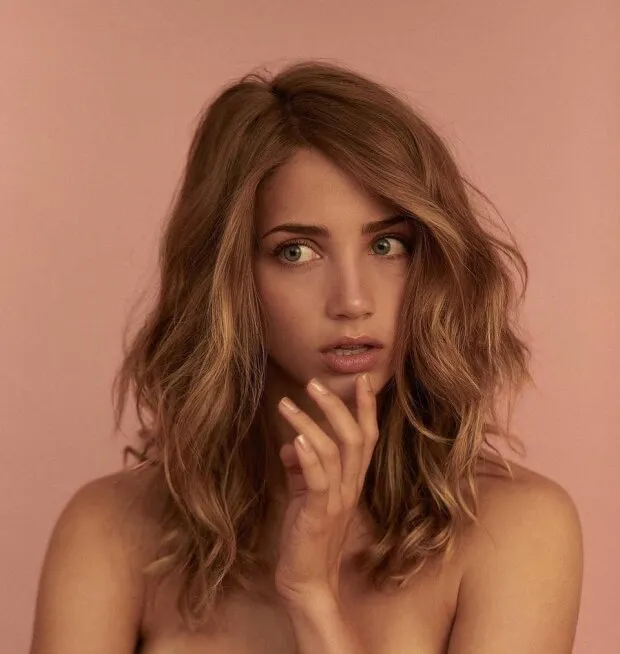 emily rudd bares her skin