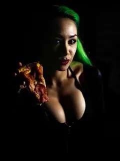 shotzi blackheart and a piece of pizza