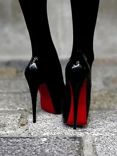 red sole high heels worn by nylon lady