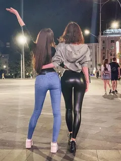 2 ladies in tight pants