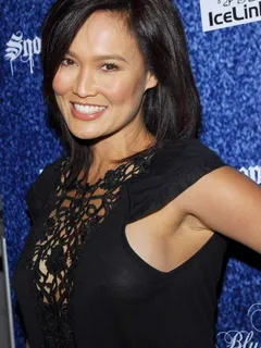 tia carrere braless see thru